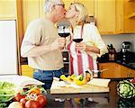 Couple Preparing Meal in Kitchen