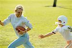 Mother and Son Playing Football