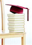 Mortarboard on Stack of Books