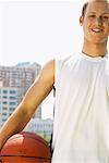 Young Man Holding Basketball