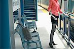 Businesswoman Waiting for Train