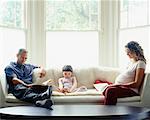 Family Relaxing on Sofa