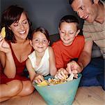 Family Eating Chips