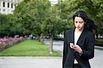 Woman Using Cell Phone Outdoors