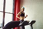 Woman Running on Treadmill