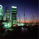 Canary Wharf and cranes on Thames