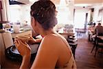 Young woman having coffee