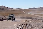 Car Driving on Dirt Road, Salta Province, Argnetina