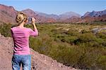 Woman Photographing Mountains, Valles Calchaquies, Salta Province, Argentina