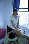 Woman Massaging Man