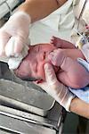 Newborn Having First Bath