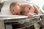 Newborn Baby Being Weighed