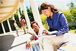 Mature Students Studying Together Outdoors