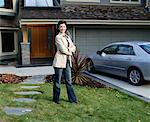 Woman in Front of House and Car