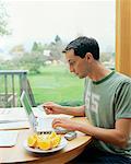 Man Using Laptop Computer