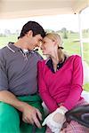 Couple in Golf Cart