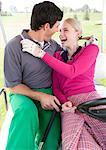 Couple in Golf Cart