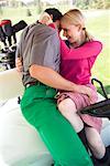 Couple Making Out in Golf Cart