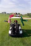 Couple with Golf Cart