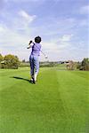 Woman Golfing