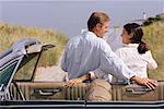 Couple Standing by Car