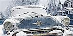 Classic Car Covered in Snow