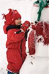 Boy Building Snowman