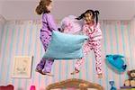 Two Girls Having a Pillow Fight