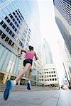 Runner Running Down City Street