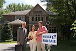 Couple with Real Estate Agent