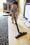 Child Vacuuming