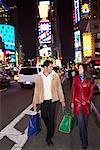 Couple in Times Square, New York City, New York, USA