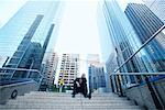 Businessman Sitting on Steps