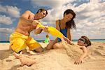 Family Playing on Beach