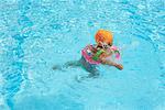 Girl Playing In Swimming Pool, Bangkok, Thailand