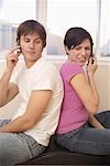 Couple Using Cellular Phones