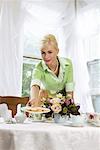 Woman Holding Plate of Cookies