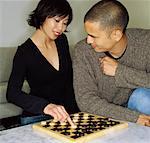 Couple Playing Checkers