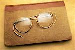 Eyeglasses and Book