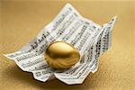 Golden Egg et Figures de Stock