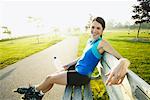 Woman Resting on Park Bench