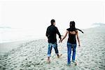 Couple Walking along Beach