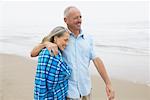 Couple Walking on Beach