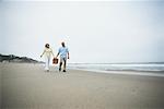 Couple Going for Picnic at Beach