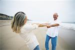 Couple Holding Hands Beach