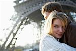 Couple by Eiffel Tower, Paris, France