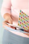 Woman Reading Greeting Card