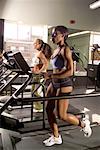 Women Using Treadmills in Gym