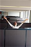 Businesswoman Cheering in Office