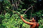 Man from Satere-Maue Tribe Hunting with Bow and Arrow, Brazil